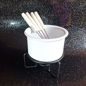 White Ceramic Fondue Pot on Black Metal Stand.